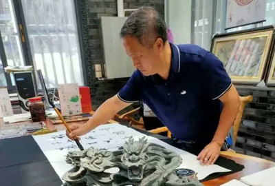乐山检察官方腾讯微博发布周绍轩书法宣传